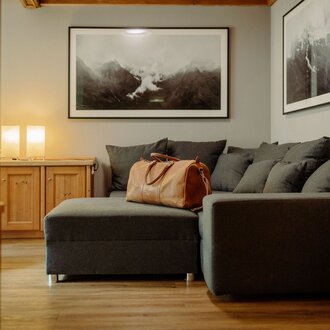 sofa in Saalbach hotel room