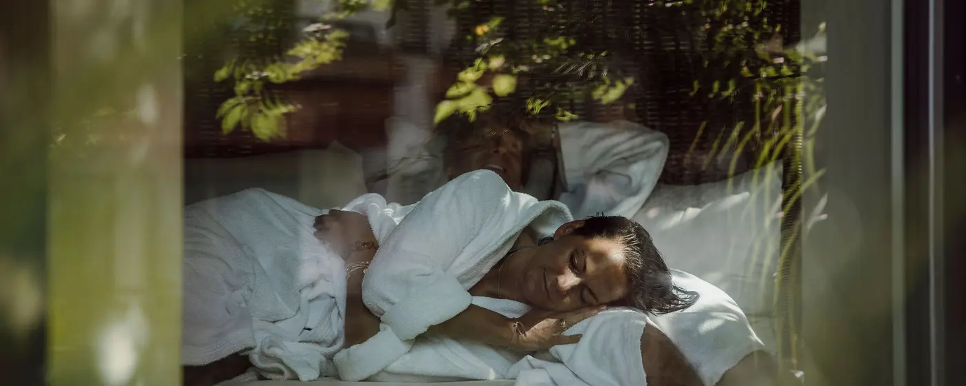 Couple in bathrobes in the wellness relaxation area